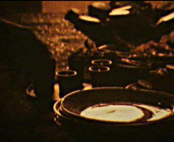 Кадр из фильма: стопки на столе
