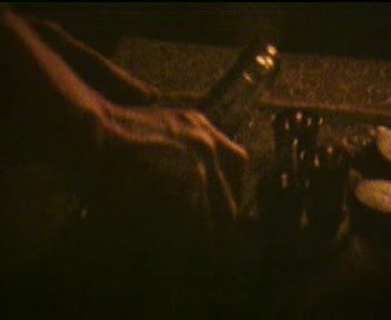 Кадр из фильма: разливают водку по стопкам