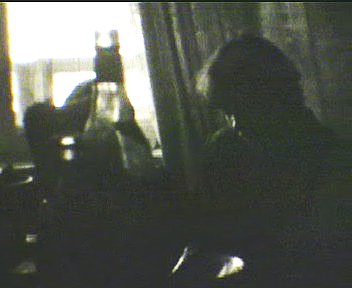 Кадр из фильма: Андрей Горшков сидит за столом